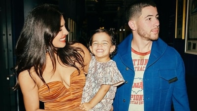 Malti Marie Chopra Jonas with parents Priyanka Chopra and Nick Jonas in London. Malti Marie Chopra Jonas with parents Priyanka Chopra and Nick Jonas in London.