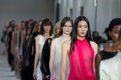 Models wear creations as part of the Alberta Ferretti Spring Summer 2025 collection, that was presented in Milan. (AP)