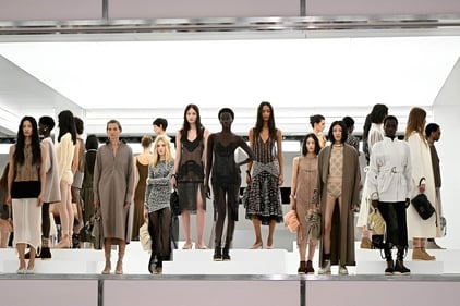 Models stand on the runway at the end of the Fendi collection show at Milan's Fashion Week Womenswear Spring / Summer 2025. (AFP)