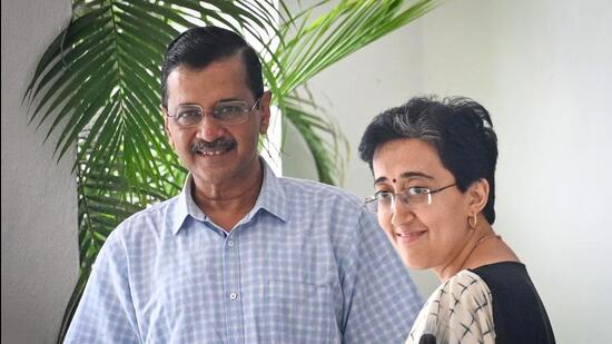 Arvind Kejriwal and Atishi after meeting the lieutenant governor. (Sanchit Khanna/HT Photo)