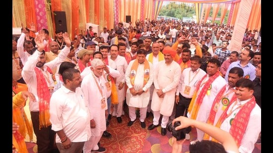 BJP candidate Gian Chand Gupta during his campaign in Panchkula on Tuesday. (Sant Arora/HT)