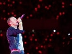Singer Chris Martin of British rock band Coldplay performs on stage during a concert at the Ernst Happel Stadium in Vienna, Austria on August 21, 2024. Security measures have been tightened in Vienna for a series of concerts by British band Coldplay this week, Austrian police said on August 20, 2024, after Taylor Swift's shows were cancelled after a suicide bombing plot. (Photo by TOBIAS STEINMAURER / APA / AFP) / Austria OUT / RESTRICTED TO EDITORIAL USE - MANDATORY MENTION OF THE ARTIST UPON PUBLICATION - TO ILLUSTRATE THE EVENT AS SPECIFIED IN THE CAPTION - NO MARKETING NO ADVERTISING CAMPAIGNS - DISTRIBUTED AS A SERVICE TO CLIENTS - NO ARCHIVE / SOUTH TYROL OUT