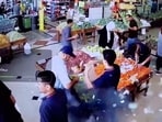 A man's bag explodes in a supermarket in Beirut, Lebanon, September 17, 2024 in this screen grab from a video obtained from social media.
