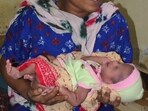 Kerrabai Rohit Gurav, 30, with her child. (Pramod Tambe)