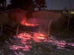 **EDS: GRAB VIA PTI VIDEOS** Nawada: Charred remains are seen after multiple houses were allegedly set on fire, in Nawada district, Bihar, late Wednesday, Sept. 18, 2024. (PTI Photo) (PTI09_19_2024_000009B) **EDS: GRAB VIA PTI VIDEOS** Nawada: Charred remains are seen after multiple houses were allegedly set on fire, in Nawada district, Bihar, late Wednesday, Sept. 18, 2024. (PTI Photo) (PTI09_19_2024_000009B)