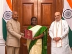 President Droupadi Murmu being presented a report on simultaneous elections in the country by former president Ram Nath Kovind who heads high-level committee (HLC) on 'One Nation, One Election', and home minister Amit Shah, at Rashtrapati Bhavan in New Delhi. President Droupadi Murmu being presented a report on simultaneous elections in the country by former president Ram Nath Kovind who heads high-level committee (HLC) on 'One Nation, One Election', and home minister Amit Shah, at Rashtrapati Bhavan in New Delhi.