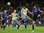 Manchester City's Ilkay Gundogan heads at goal 