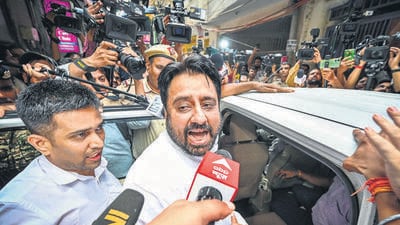 Amanatullah Khan after his arrest by ED. (Sanchit Khanna/HT) Amanatullah Khan after his arrest by ED. (Sanchit Khanna/HT)