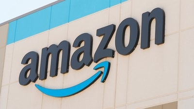 The Amazon logo is seen. Ex-AWS engineer John McBride asserts that Amazon's new office policy is part of a strategic five-phase plan to reduce costs and workforce. He highlights how the return-to-office mandate is primarily influenced by economic considerations. (AP) The Amazon logo is seen. Ex-AWS engineer John McBride asserts that Amazon's new office policy is part of a strategic five-phase plan to reduce costs and workforce. He highlights how the return-to-office mandate is primarily influenced by economic considerations. (AP)