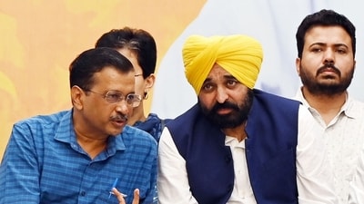 Delhi chief minister Arvind Kejriwal with Punjab CM Bhagwant Mann, during the programme on Sunday. (Arvind Yadav/Hindustan Times)