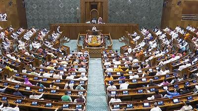 New Delhi, Sept 19 (ANI): Members of Parliament attend the Special Session in Lok Sabha at the new building of Parliament in New Delhi on Tuesday. (ANI Photo/Sansad TV) (ANI) New Delhi, Sept 19 (ANI): Members of Parliament attend the Special Session in Lok Sabha at the new building of Parliament in New Delhi on Tuesday. (ANI Photo/Sansad TV) (ANI)