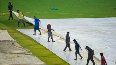 Groundsmen at work during a rain break in Chennai (representative image) (PTI) Groundsmen at work during a rain break in Chennai (representative image) (PTI)