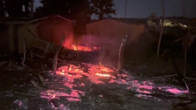 **EDS: GRAB VIA PTI VIDEOS** Nawada: Charred remains are seen after multiple houses were allegedly set on fire, in Nawada district, Bihar, late Wednesday, Sept. 18, 2024. (PTI Photo) (PTI09_19_2024_000009B) (PTI) **EDS: GRAB VIA PTI VIDEOS** Nawada: Charred remains are seen after multiple houses were allegedly set on fire, in Nawada district, Bihar, late Wednesday, Sept. 18, 2024. (PTI Photo) (PTI09_19_2024_000009B) (PTI)