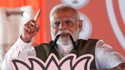 Srinagar: Prime Minister Narendra Modi addresses an election rally in support of BJP candidates at Shere-e-Kashmir Cricket Stadium. (PTI) Srinagar: Prime Minister Narendra Modi addresses an election rally in support of BJP candidates at Shere-e-Kashmir Cricket Stadium. (PTI)