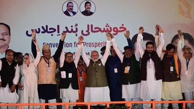 Prime Minister Narendra Modi with BJP candidates at an election rally at the the Sher-i-Kashmir Stadium in Srinagar on Thursday. (Waseem Andrabi/HT) Prime Minister Narendra Modi with BJP candidates at an election rally at the the Sher-i-Kashmir Stadium in Srinagar on Thursday. (Waseem Andrabi/HT)