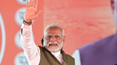 Prime minister Narendra Modi waves towards the crowd as he arrives to address a assembly election rally at Sher-i-Kashmir Stadium in Srinagar,on September 19. (HT Photo) Prime minister Narendra Modi waves towards the crowd as he arrives to address a assembly election rally at Sher-i-Kashmir Stadium in Srinagar,on September 19. (HT Photo)