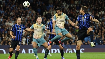 Manchester City's Ilkay Gundogan heads at goal (REUTERS)