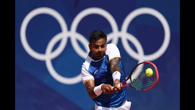 Sumit Nagal in action during his first round match against Corentin Moutet of France during the Paris Olympics. (REUTERS) Sumit Nagal in action during his first round match against Corentin Moutet of France during the Paris Olympics. (REUTERS)