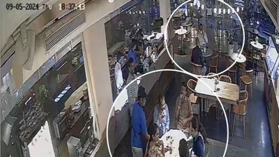 Excise Department officials during the raid at Ariko Cafe in Hyderabad, captured on CCTV. (Instagram/Ariko Cafe) Excise Department officials during the raid at Ariko Cafe in Hyderabad, captured on CCTV. (Instagram/Ariko Cafe)
