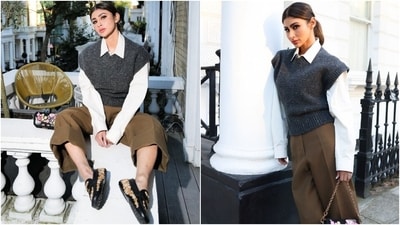 Mouni Roy also attended the launch event of Tods x Rahul Mishra at the TOD’s boutique, Old Bond Street in London. Embracing business casual style with a touch of fall aesthetic, Mouni wore a crisp white skirt, a blue wool sweater vest, and brown pants.&nbsp; 