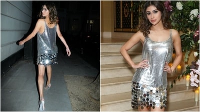 During her time in London, Mouni also attended a Vogue party in a dazzling Rabanne mini dress. The silver ensemble features a scoop neckline, large circular sequins embellished on the hem, and a figure-skimming silhouette.&nbsp; 
