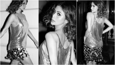 Mouni paired the party-girl look with diamond rings, embellished silver slingback pumps, smokey eyes, glossy pink lips, darkened brows, and rouge-tinted cheeks. As for her shoulder-length tresses, she left them loose in a centre parting and styled them with soft waves.&nbsp; 