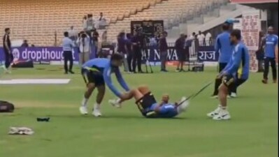 Rishabh Pant (L) and Virat Kohli (R) drag Kuldeep Yadav (X) Rishabh Pant (L) and Virat Kohli (R) drag Kuldeep Yadav (X)