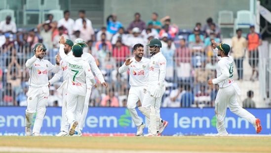 Bangladesh's Mehidy Hassan Miraz, centre, celebrates the wicket of India's KL Rahul with teammates on the first day of the first cricket test match between India and Bangladesh, in Chennai, India, Thursday, Sept.19, 2024. (AP)