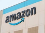 The Amazon logo is seen on the exterior wall of the Amazon OXR1 fulfillment center in Oxnard, Calif., on Wednesday, Aug. 21, 2024. (AP Photo/Damian Dovarganes)