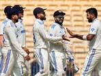 India's Jasprit Bumrah celebrates with teammates after taking the wicket of Bangladesh's Hasan Mahmud on the second day of the first test India's Jasprit Bumrah celebrates with teammates after taking the wicket of Bangladesh's Hasan Mahmud on the second day of the first test