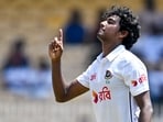 Hasan Mahmud (L) gestures as he celebrates after taking five wickets during the second day of the first Test cricket match between India and Bangladesh Hasan Mahmud (L) gestures as he celebrates after taking five wickets during the second day of the first Test cricket match between India and Bangladesh
