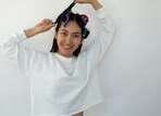 Achieve stunning, natural curls without heat damage using heatless hair curlers.