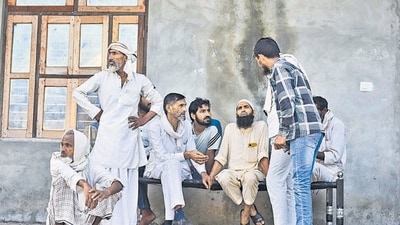 A group of men discusses the upcoming Haryana assembly polls at Chandeni village in Nuh. (Parveen Kumar/HT) A group of men discusses the upcoming Haryana assembly polls at Chandeni village in Nuh. (Parveen Kumar/HT)