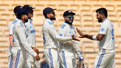 India's Jasprit Bumrah celebrates with teammates after taking the wicket of Bangladesh's Hasan Mahmud on the second day of the first test (PTI) India's Jasprit Bumrah celebrates with teammates after taking the wicket of Bangladesh's Hasan Mahmud on the second day of the first test (PTI)