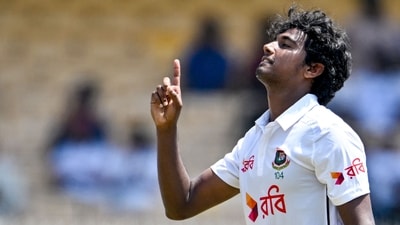 Hasan Mahmud (L) gestures as he celebrates after taking five wickets during the second day of the first Test cricket match between India and Bangladesh (AFP) Hasan Mahmud (L) gestures as he celebrates after taking five wickets during the second day of the first Test cricket match between India and Bangladesh (AFP)