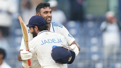 India's Ravichandran Ashwin celebrates after scoring a century with Ravindra Jadeja (AP) India's Ravichandran Ashwin celebrates after scoring a century with Ravindra Jadeja (AP)