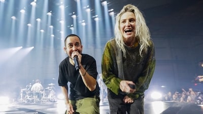 Mike Shinoda, left, and Emily Armstrong of Linkin Park perform on Thursday, Sept. 5, 2024, in Los Angeles. It was announced on Thursday that Dead Sara's Emily Armstrong would join as the band's new co-singer and songwriter/producer Colin Brittain would join on drums. Linkin Park will release the album "From Zero" on Nov. 15, marking their first new record since former frontman Chester Bennington died in 2017. (Photo by Jordan Strauss/Invision/AP) (Jordan Strauss/Invision/AP) Mike Shinoda, left, and Emily Armstrong of Linkin Park perform on Thursday, Sept. 5, 2024, in Los Angeles. It was announced on Thursday that Dead Sara's Emily Armstrong would join as the band's new co-singer and songwriter/producer Colin Brittain would join on drums. Linkin Park will release the album "From Zero" on Nov. 15, marking their first new record since former frontman Chester Bennington died in 2017. (Photo by Jordan Strauss/Invision/AP) (Jordan Strauss/Invision/AP)