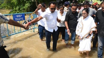 West Bengal Chief Minister Mamata Banerjee during a visit to the flood affected areas of Panskura, in Purba Medinipur district of West Bengal. (PTI) West Bengal Chief Minister Mamata Banerjee during a visit to the flood affected areas of Panskura, in Purba Medinipur district of West Bengal. (PTI)