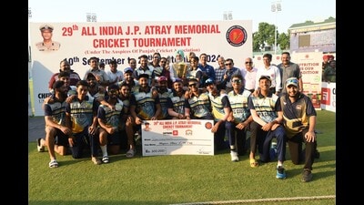 PCA Colts in a jubilant mood after winning JP Atray memorial cricket tournament at the IS Bindra PCA Stadium in Mohali on Friday. (HT Photo)