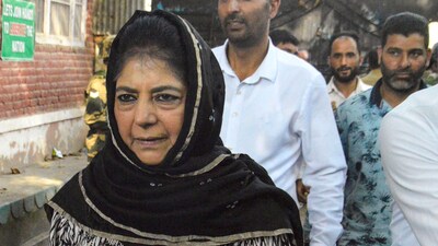 PDP President Mehbooba Mufti arrives to cast her vote at Bejbehara polling station during the first phase of Jammu and Kashmir Assembly elections. (PTI) PDP President Mehbooba Mufti arrives to cast her vote at Bejbehara polling station during the first phase of Jammu and Kashmir Assembly elections. (PTI)