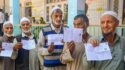 Anantnag: Voters show their voting slips as they wait to cast votes at a polling station during the first phase of Jammu and Kashmir Assembly elections, in Anantnag district of J&K, Wednesday, Sept. 18, 2024. (PTI Photo)(PTI09_18_2024_000229A) (PTI) Anantnag: Voters show their voting slips as they wait to cast votes at a polling station during the first phase of Jammu and Kashmir Assembly elections, in Anantnag district of J&K, Wednesday, Sept. 18, 2024. (PTI Photo)(PTI09_18_2024_000229A) (PTI)