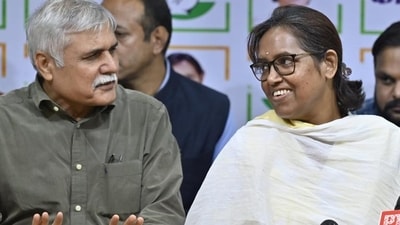 Sanjay Pandey was inducted into the Congress at a programme held at the Mumbai Congress office on Thursday evening. UB Venkatesh, senior Congress leader, and Varsha Gaikwad, Mumbai Congress president and Mumbai North Central MP, were present at the programme. (Anshuman Poyrekar/ Hindustan Times)