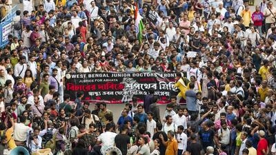 The protesting junior doctors take part in a march to CBI office in Kolkata on Friday. (PTI) The protesting junior doctors take part in a march to CBI office in Kolkata on Friday. (PTI)