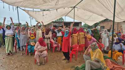 The villagers, including elderly and women, have been sitting on indefinite protest on the village outskirts while accusing a mining company of exceeding its permitted limit of 180 feet to excavate the stones. (HT Photo) The villagers, including elderly and women, have been sitting on indefinite protest on the village outskirts while accusing a mining company of exceeding its permitted limit of 180 feet to excavate the stones. (HT Photo)