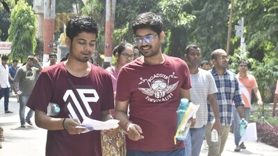 Candidates are seen discussing after appearing for the UPSC Civil Services Main Examination 2024 at College of Commerce in Patna. (Santosh Kumar) Candidates are seen discussing after appearing for the UPSC Civil Services Main Examination 2024 at College of Commerce in Patna. (Santosh Kumar)
