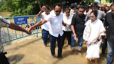 West Bengal chief minister Mamata Banerjee during a visit to the flood affected areas in East Medinipur district on Thursday. (PTI) West Bengal chief minister Mamata Banerjee during a visit to the flood affected areas in East Medinipur district on Thursday. (PTI)