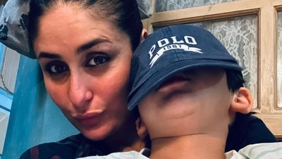 Kareena makes her famous pout, as Taimur takes a nap in the cute picture. Kareena makes her famous pout, as Taimur takes a nap in the cute picture.