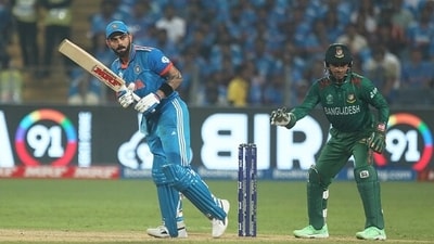 Virat Kohli (L) and Mushfiqur Rahim during the 2023 ODI World Cup. (Getty)