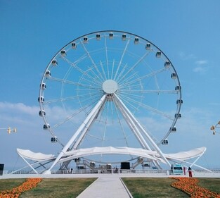 The ferris wheel provides amazing views of the sea and the city. (Pexels) The ferris wheel provides amazing views of the sea and the city. (Pexels)