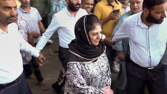 PDP President Mehbooba Mufti arrives to cast her vote at Bejbehara polling station during the first phase of Jammu and Kashmir Assembly elections. (PTI)